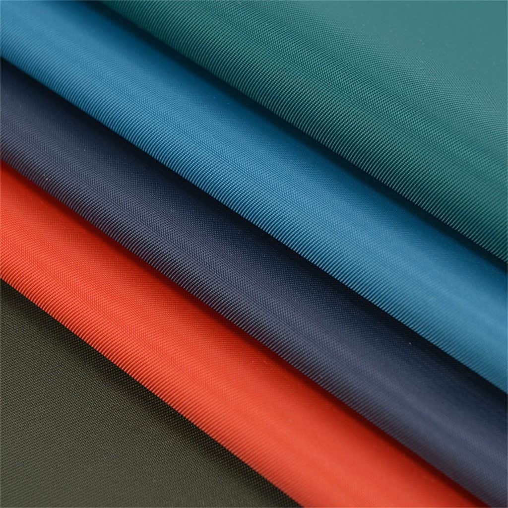ECONYL® Regenerated Nylon — 10 นวัตกรรมเส้นใยและผ้ารีไซเคิลยอดนิยมสำหรับการสั่งผลิตเสื้อผ้าแฟชั่นรักษ์โลก ปี 2026